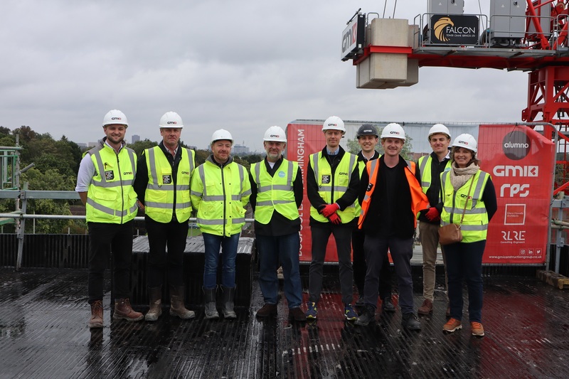 The development team mark the topping out of Pershore Junction