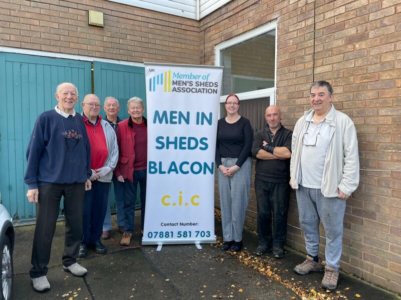Committee and members of Men in Sheds with Gaynor Layton manager at Chester Day Opportunities