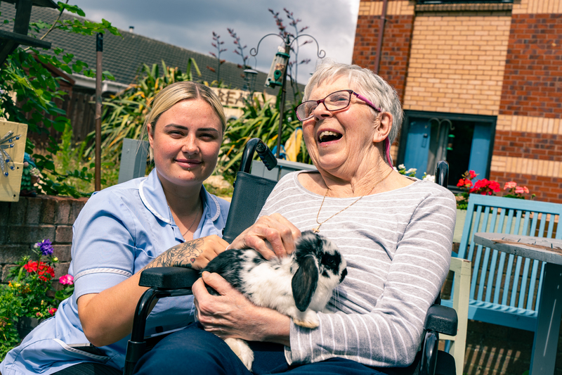Appleby's Leoni Nicholson with resident Eileen Scott and Oreo the bunny, a therapy support animal at the home 