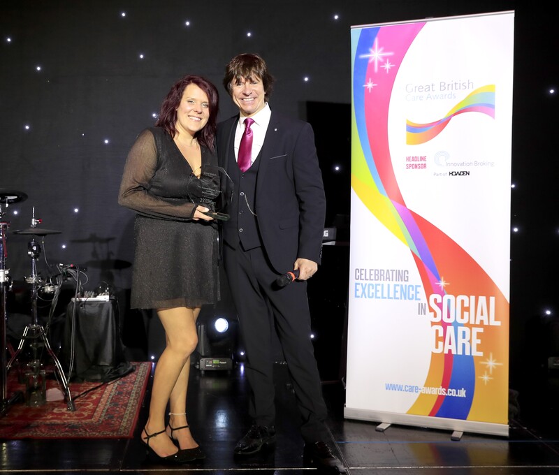 Jodie Trenoweth receives her award at the celebration 
