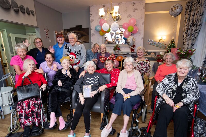 Cora Reeves celebrates with staff and residents 