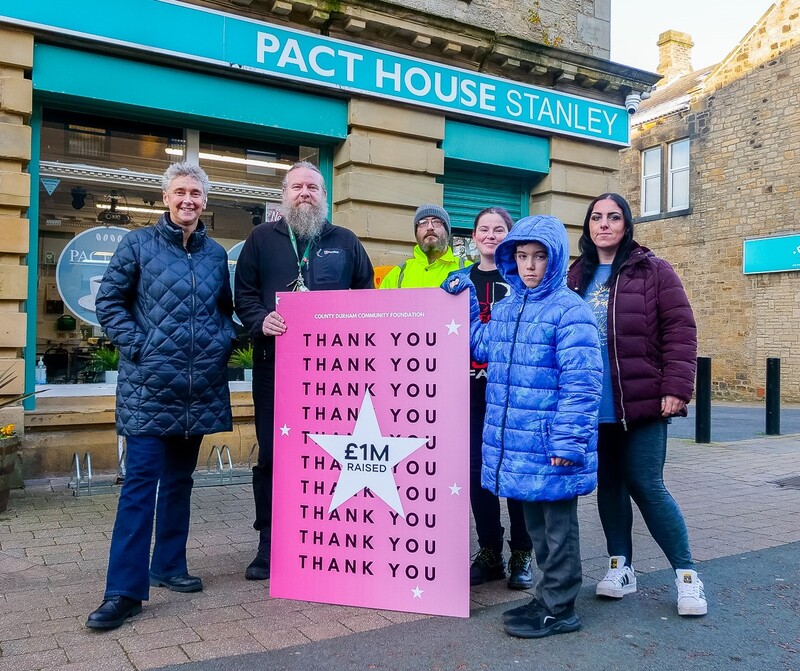 Chief Executive of County Durham Community Foundation, Michelle Cooper MBE (left) with Darren McMahon from PACT House in Stanley and local people