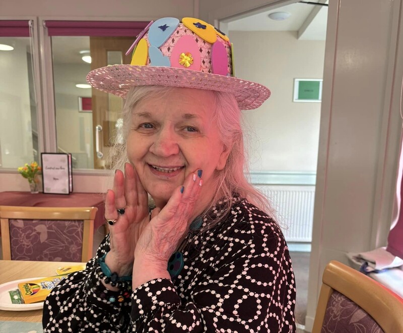  Resident Edna Matthews shows off a Easter bonnet