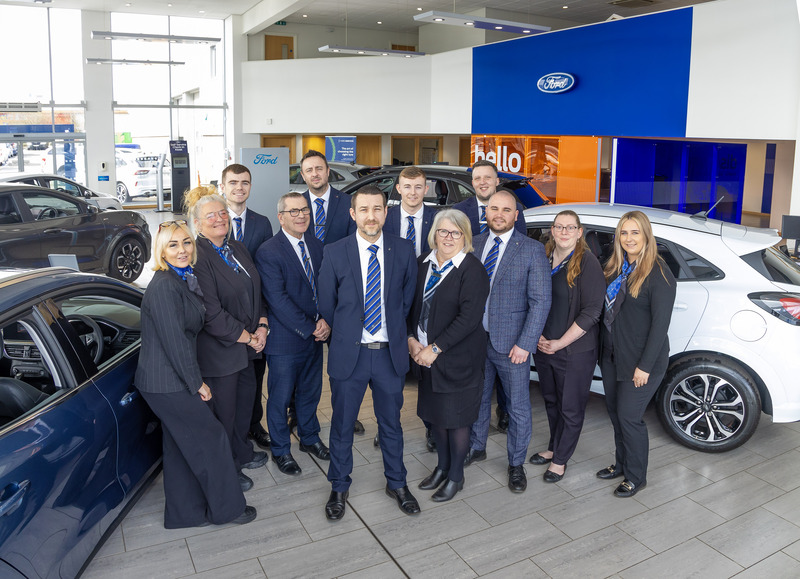 Kenny Jones, General Manager at Bristol Street Motors Wigan Ford with team.