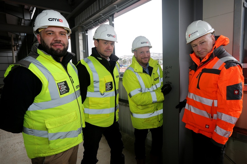 L-R: Eugene Carnell, GMI Senior Project Manager, Tom Maltby of Canmoor Asset Management, Gareth Jones, GMI’s Divisional Managing Director, Midlands, and Simon Dale, Director of Operations at St Francis Group, perform the steel signing ceremony